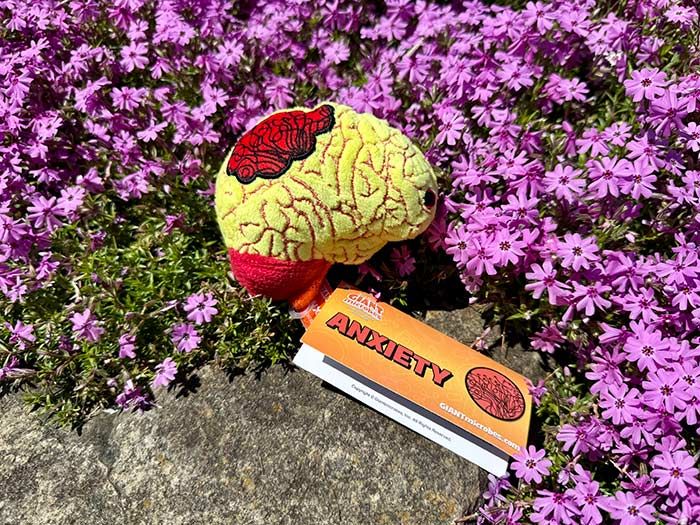 Anxiety plush with flowers