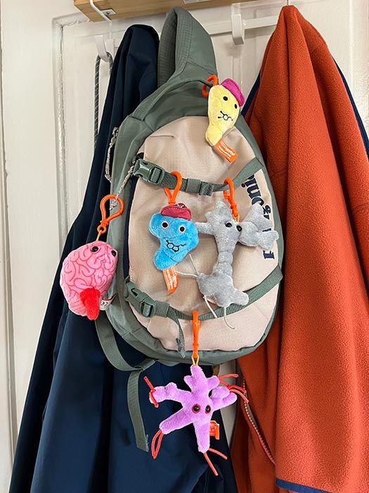 Brain Science key rings on backpack