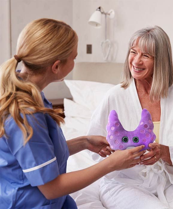 Thyroid plush nurse with patient
