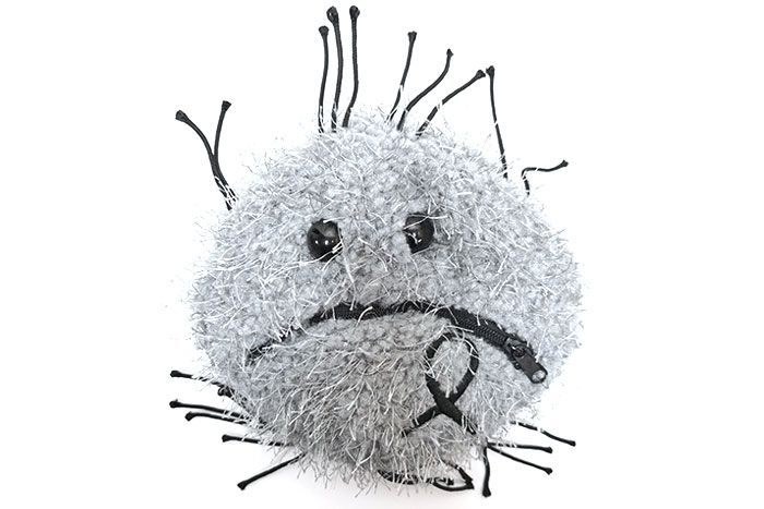 Melanoma plush doll