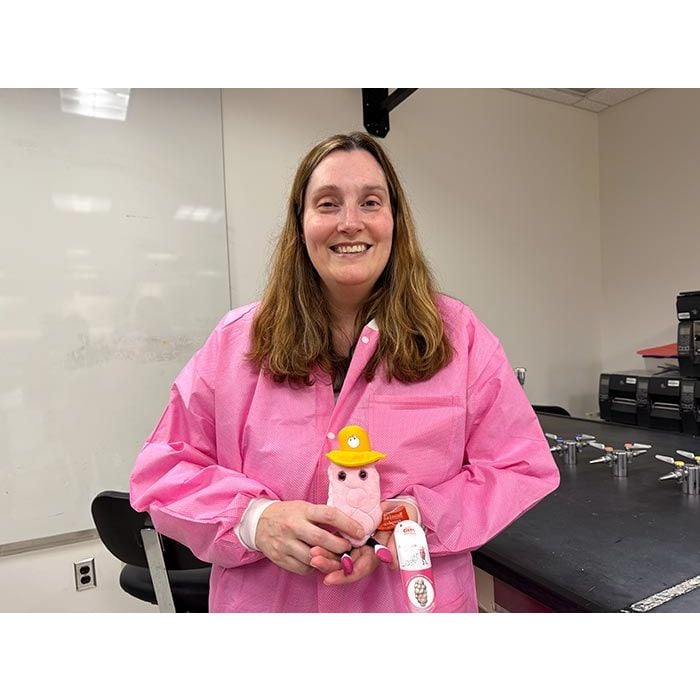 Estrogen plush with pink lab coat