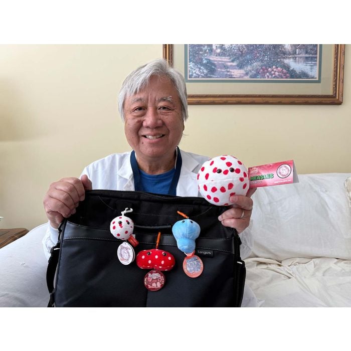 Measles and MMR plushies on bag