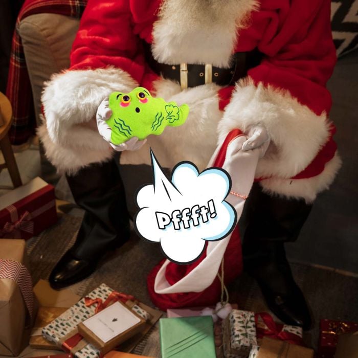 Santa holding Fart plush