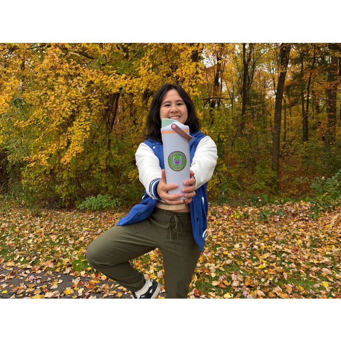 Thyroid sticker on bottle in woods
