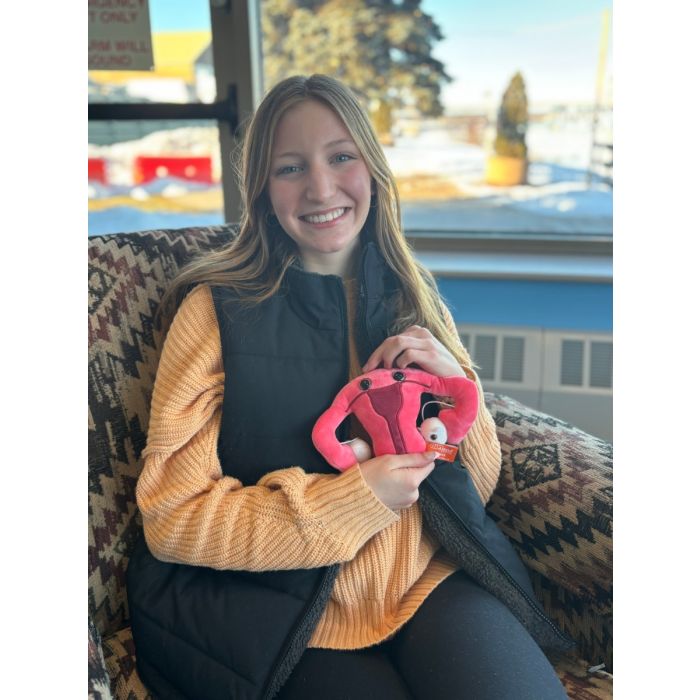 Model holding Uterus plush Model holding Uterus plush