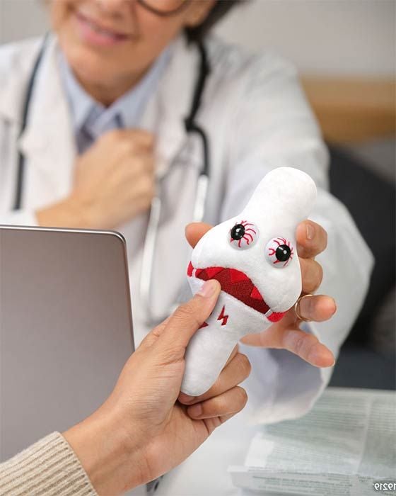 Arthritis plush with patient