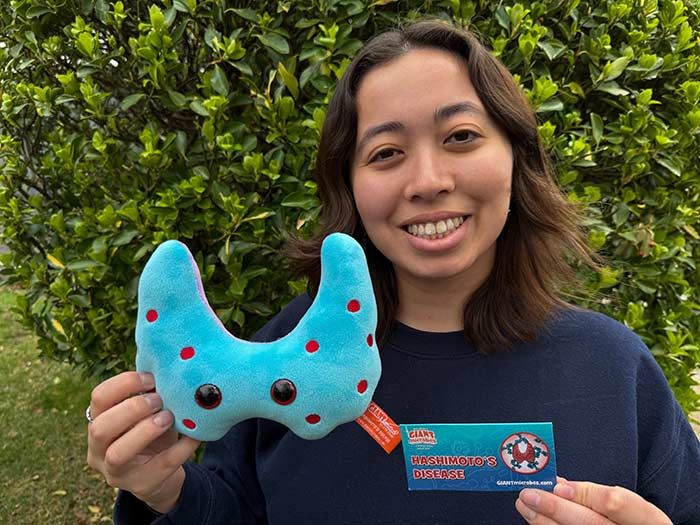 Model with Hashimoto plush blue