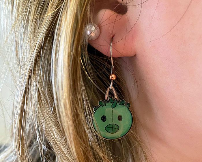 STI earring girl left