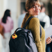 Autism key chain on girl's backpack
