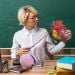 Teacher holding Heart and Brain models