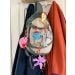 Brain Science key chains on backpack