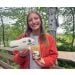 Diplodocus plush in hand