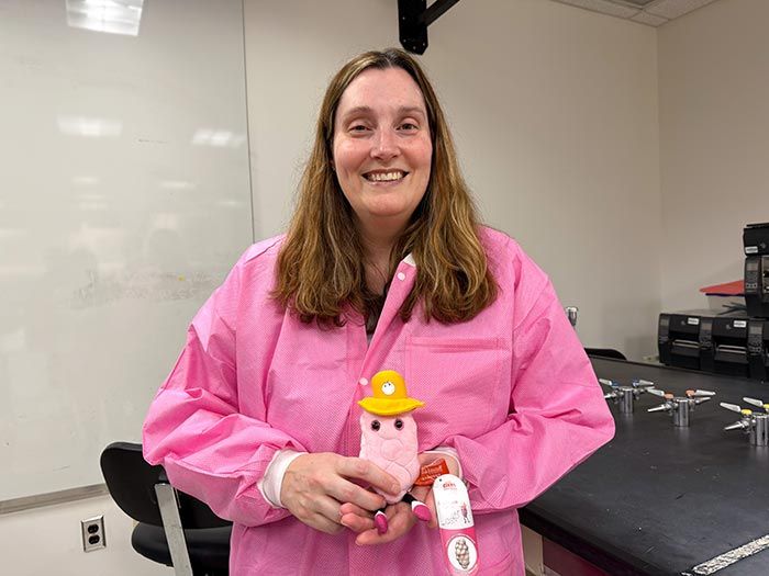 Estrogen plush with pink lab coat