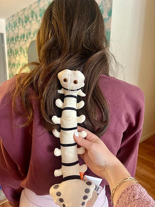 Spine plush back woman