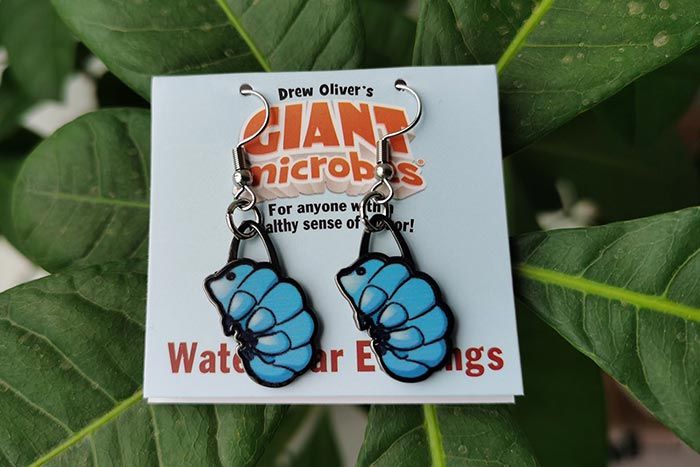 Waterbear earrings on leaves